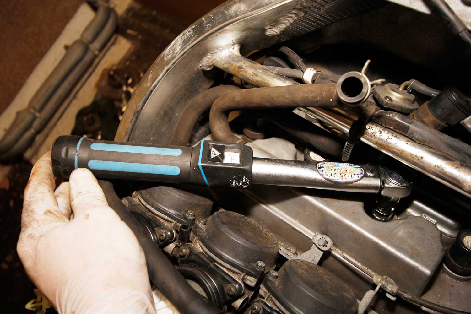 11: Plugs can be fitted by tightening half a turn with a standard ratchet once the plug’s gasket meets the cylinder head. I far prefer the accuracy, reliability and safety of using a torque wrench.