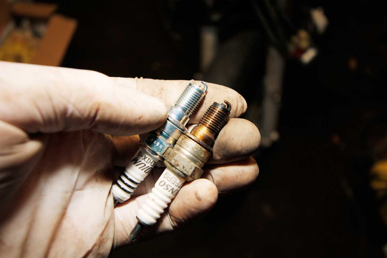 8: Double-check that you’ve bought the right plugs by holding the old and new ones next to each other and checking they’re the same length. I also check the plug’s gap too (see panel).