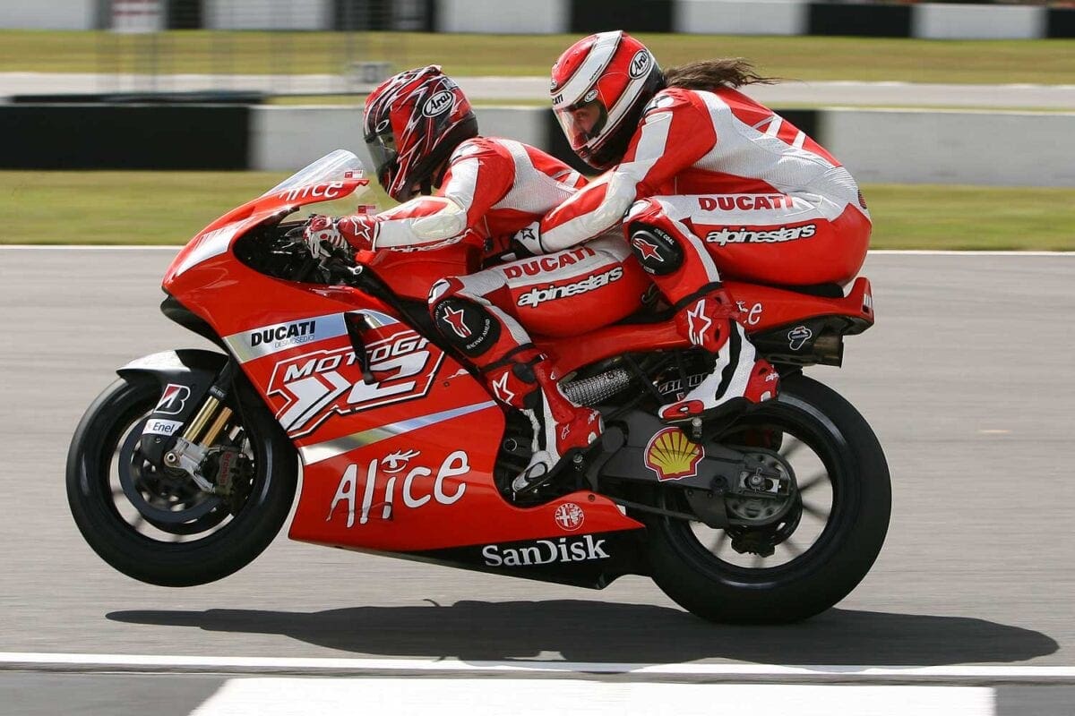 Ross-Noble-on-Ducati-two-seater-Randy-Mamola-pillion-
