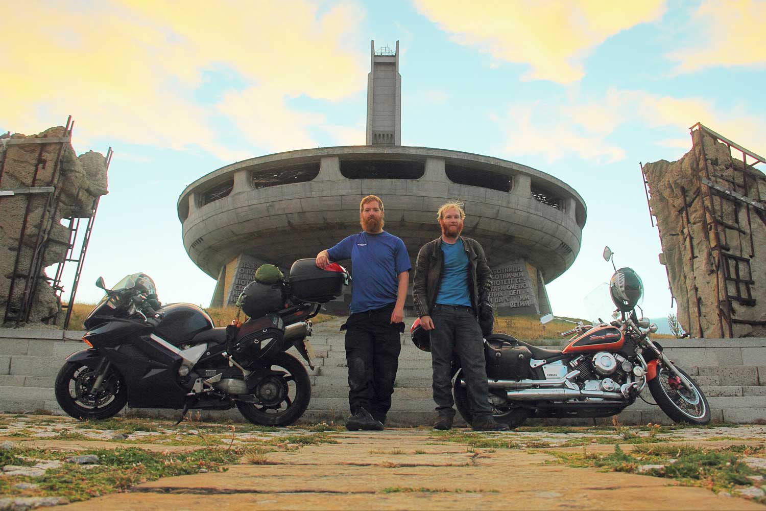 Gareth and James in front of Buzludzha, the strange abandoned soviet UFO building on a mountaintop in Bulgaria.