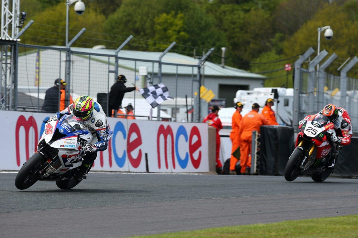 2015 British Superbike Championship, BSB R04, Oulton Park, Cheshire, UK. 3rd May 2015. Tommy Bridewell, Devizes, Tyco BMW Motorrad Racing wins race 1 from Josh Brookes, Australia, Milwaukee Yamaha and Shane Byrne, Sittingbourne, PBM Kawasaki