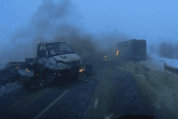 Driver-skims-through-the-middle-of-fireball-motorway-crash