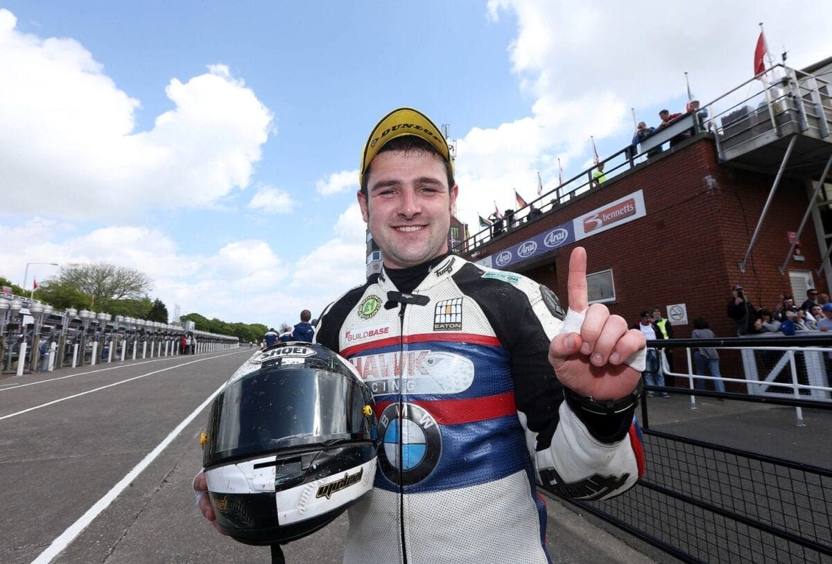 Northern Ireland- 31st May 2014 Mandatory Credit - Photo Matt Mackey/Presseye.com Isle of Man TT 2014. Isle of Man Tourist Trophy Dainese Superbike race. Race winner Ballymoney man Michael Dunlop celebrates.
