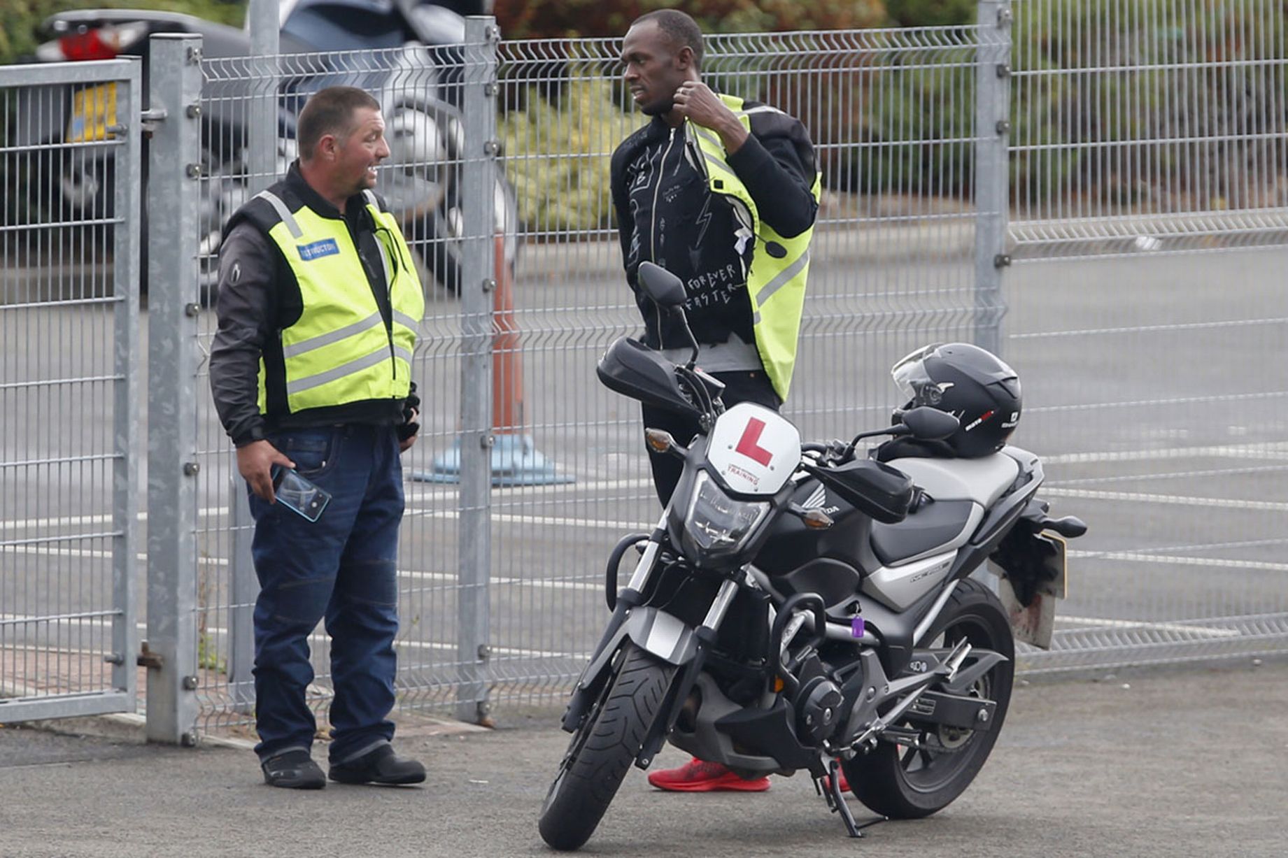 PICTURES Usain Bolt takes his motorcycle test in LONDON MoreBikes