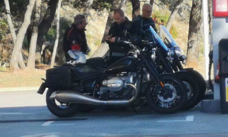 Two BMW R18 cruiser motorcycles caught on camera.