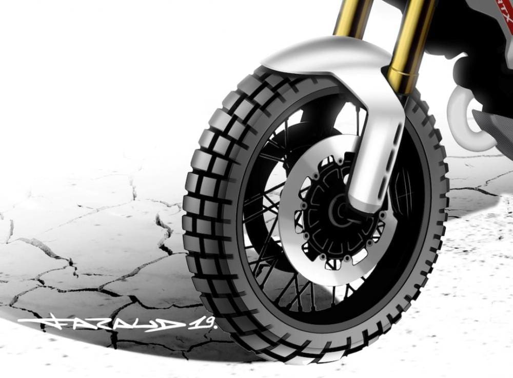 Big tyres and lots of suspension = good. Hugging front mudguard = bad if you're mud-plugging.