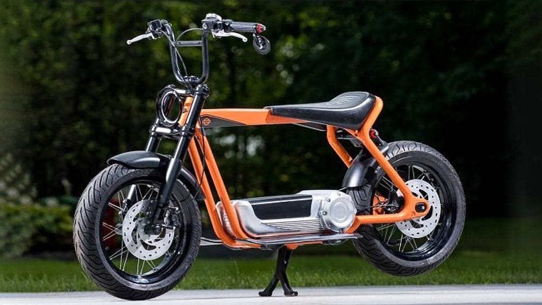 Wire wheels, handlebar drop mirror, long seat and stretched frame. It kind of looks like the sort of thing a teenager would put together in their garage back in the 1970s. The electric motor and big battery, plus that sweet round LED headlight are the only real modern convention - looks wise.