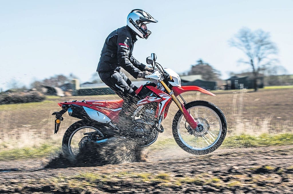 A motorcyclist riding off-raod.