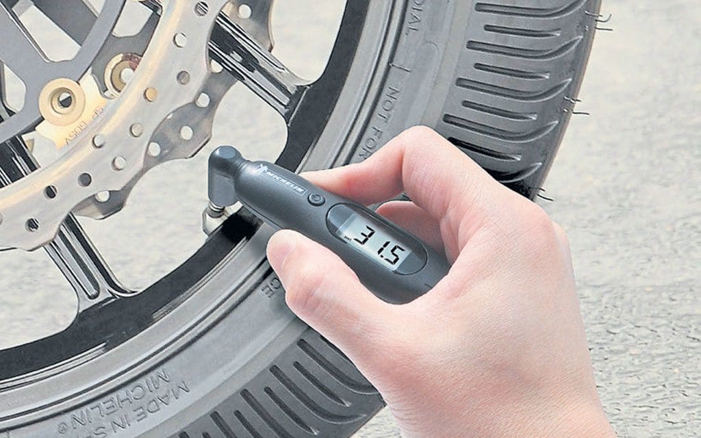 Bike tyres 2. A close up of a tyre pressure checker.