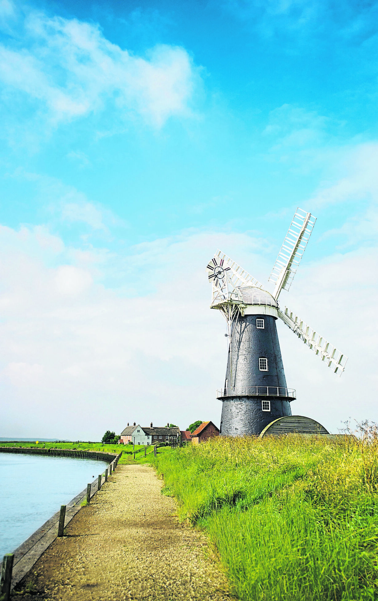 Norfolk Broads black and white windmill on a summer day landscape